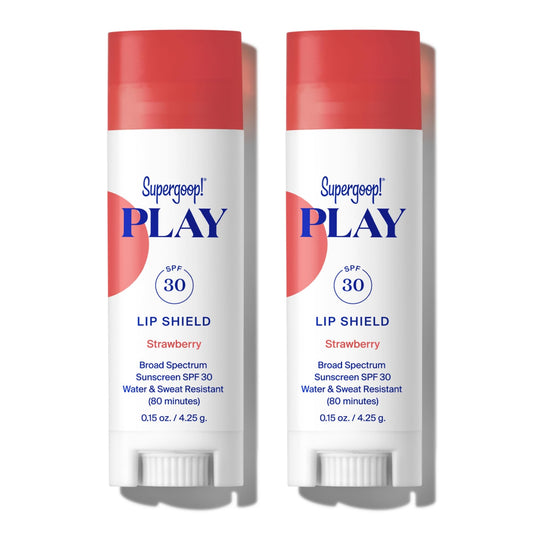 Supergoop! Play Lip Shield SPF 30 strawberry tube protects lips with moisturizing hydration.