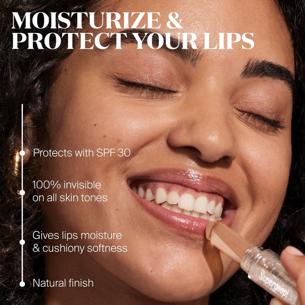 Supergoop! Unseen Lip Balm tube close-up shows smooth glide and UV shield.