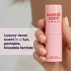 Sweetums SweetSpot Sweet Rose applied on lips and pulse points for subtle fragrance