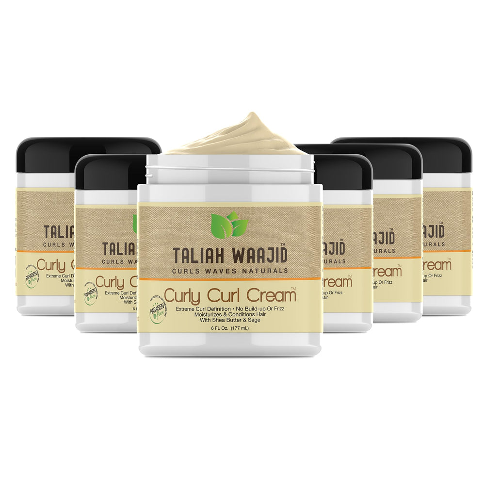 Taliah Waajid bottle pour highlights defined curls.