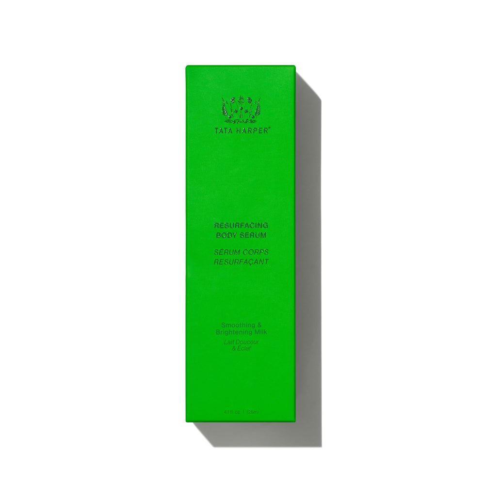 Tata Harper Resurfacing Body Serum full-body use scenario on bathroom shelf.