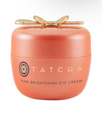 TATCHA Brightening Eye Cream bottle showing 12-hour vitamin C release for brightness