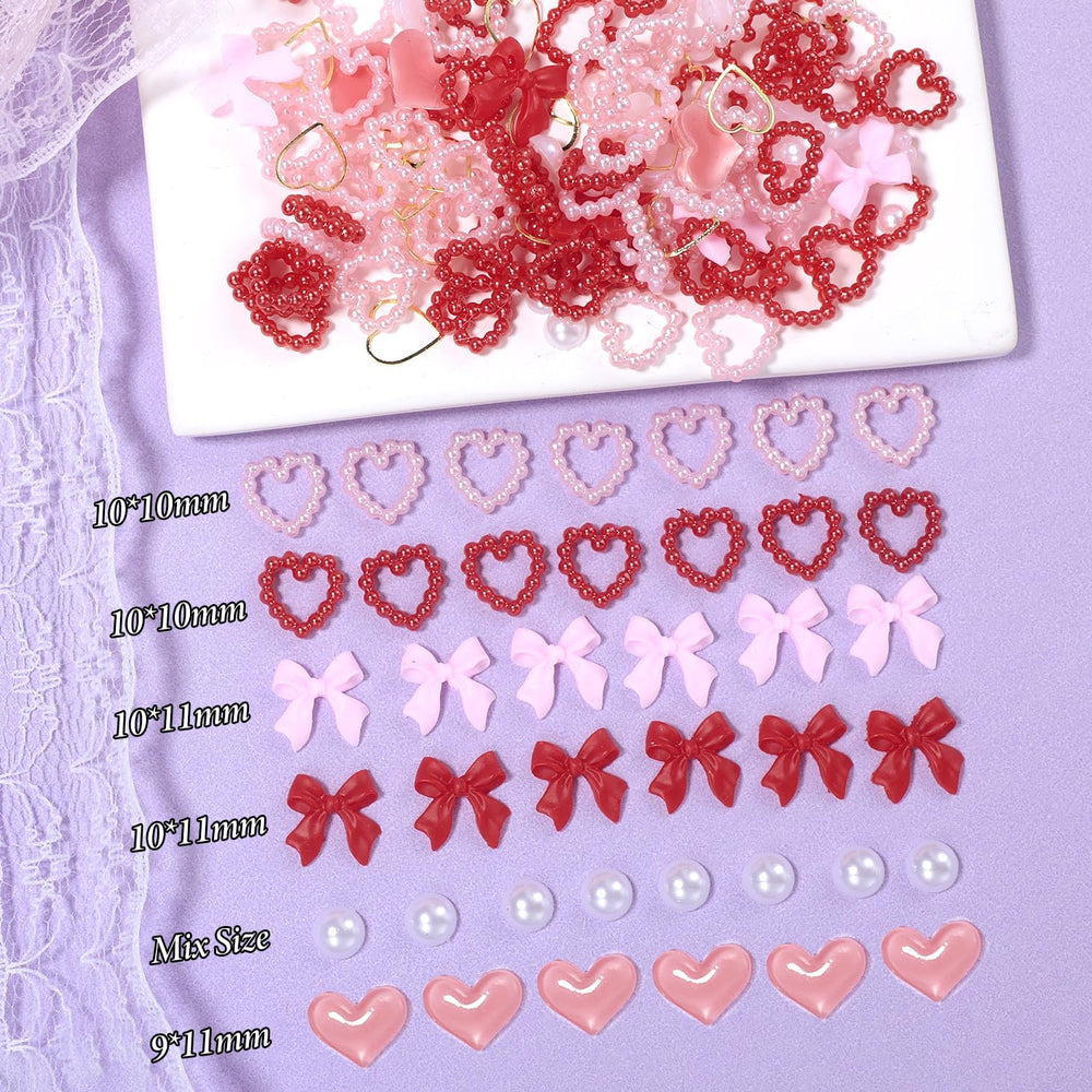 Tatiwoo pink-red heart charms create romantic focal points for nails.
