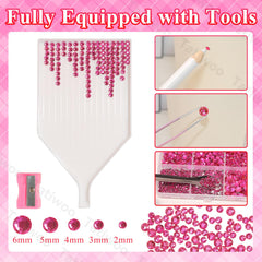 Tatiwoo wax pen, tweezers, and scoop enable precise gem placement