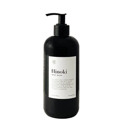 TE + TE Hinoki Body Wash bottle pour highlights a calming, Hinoki-infused cleanse.