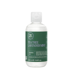 Tea Tree Lavender Mint Defining Gel bottle showing lightweight frizz control for curls.