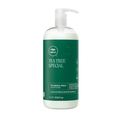 Tea Tree Special Conditioner bottle tingling the scalp for a refreshing start.