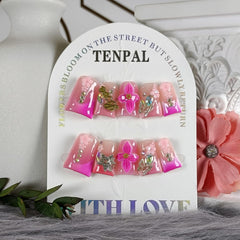 TENPAL 3D flower and star bow embellishments add detail to nail tips.