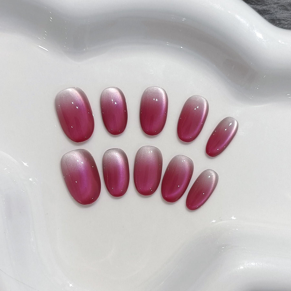 TENPAL cat-eye glow nails with shimmering finish for a statement style.
