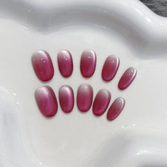 TENPAL cat-eye glow nails with shimmering finish for a statement style.