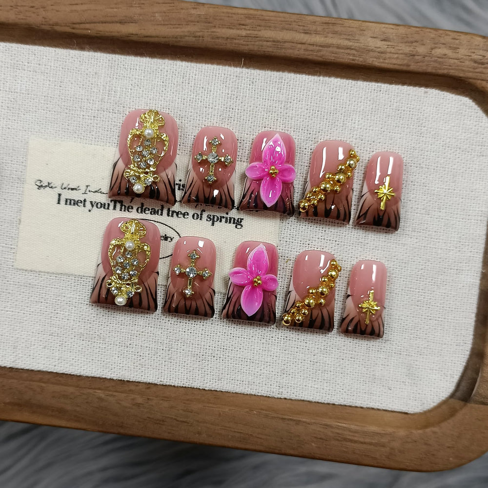 TENPAL duckbill nails with zebra-pink floral design for bold party styling