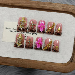 TENPAL duckbill nails with zebra-pink floral design for bold party styling