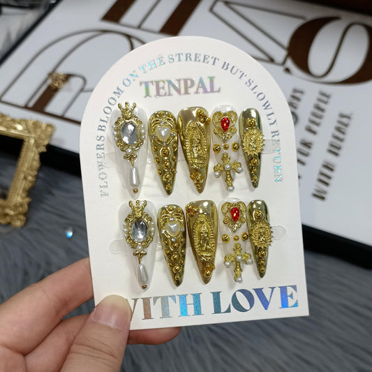 TENPAL royal press-on nails in gold stiletto with pearl charms for elegant events.