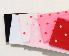 TERSE headbands in red and pink tones elevate Valentine looks