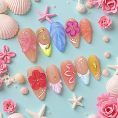 Tesytto blue-nude base nails with French tips for chic day-to-night looks.