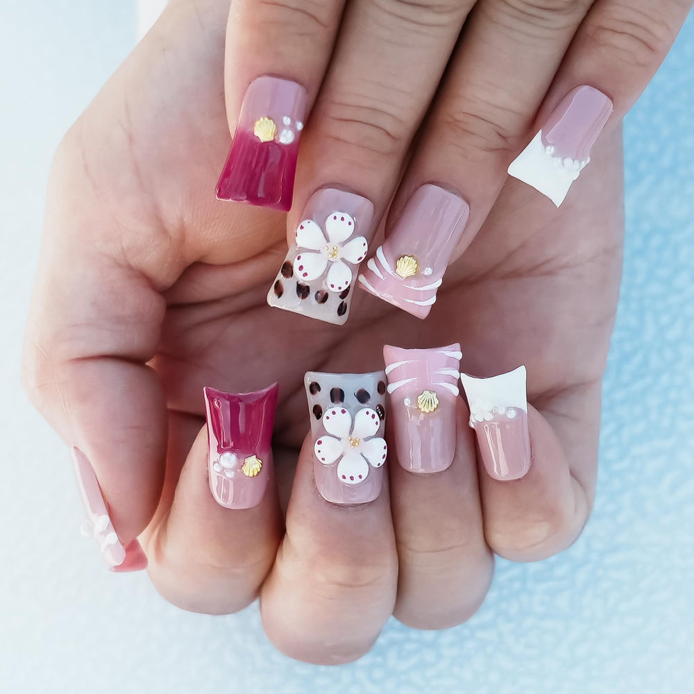 Tesytto nails showing 3D floral leopard print for statement style.