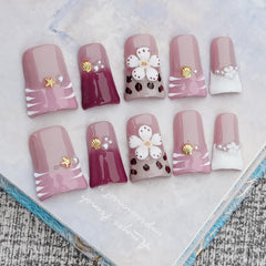 Tesytto nude base nails with rose gloss for everyday wear.