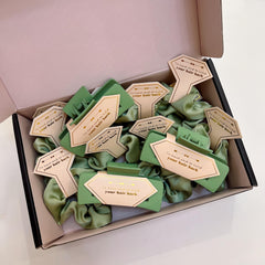 Tethzeng sage-green accessories add vibrant flair to bridesmaid gifts and bachelorette favors.