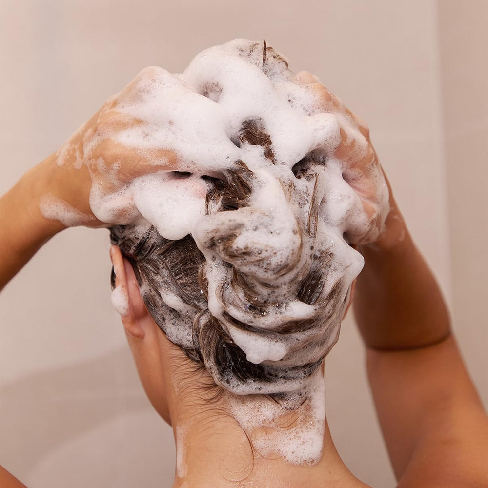 Thanks to Nature Hydrate & Nourish Shampoo being poured to cleanse roots and add shine