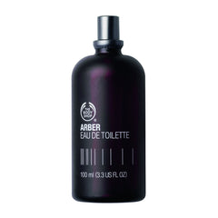 Close-up of Activist EDT bottle highlighting citrus notes and spicy heart.