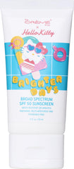 The Crème Shop Hello Kitty sunscreen bottle on vanity, fragrance-free daily protection.