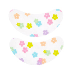 The Crème Shop Mult-Eye Task under eye patches closeup shows the all-nighter design for soothing eye care.