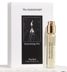 The Harmonist Hypnotizing Fire Parfum Travel Spray bottle, ideal for on-the-go warmth and subtle evening allure.