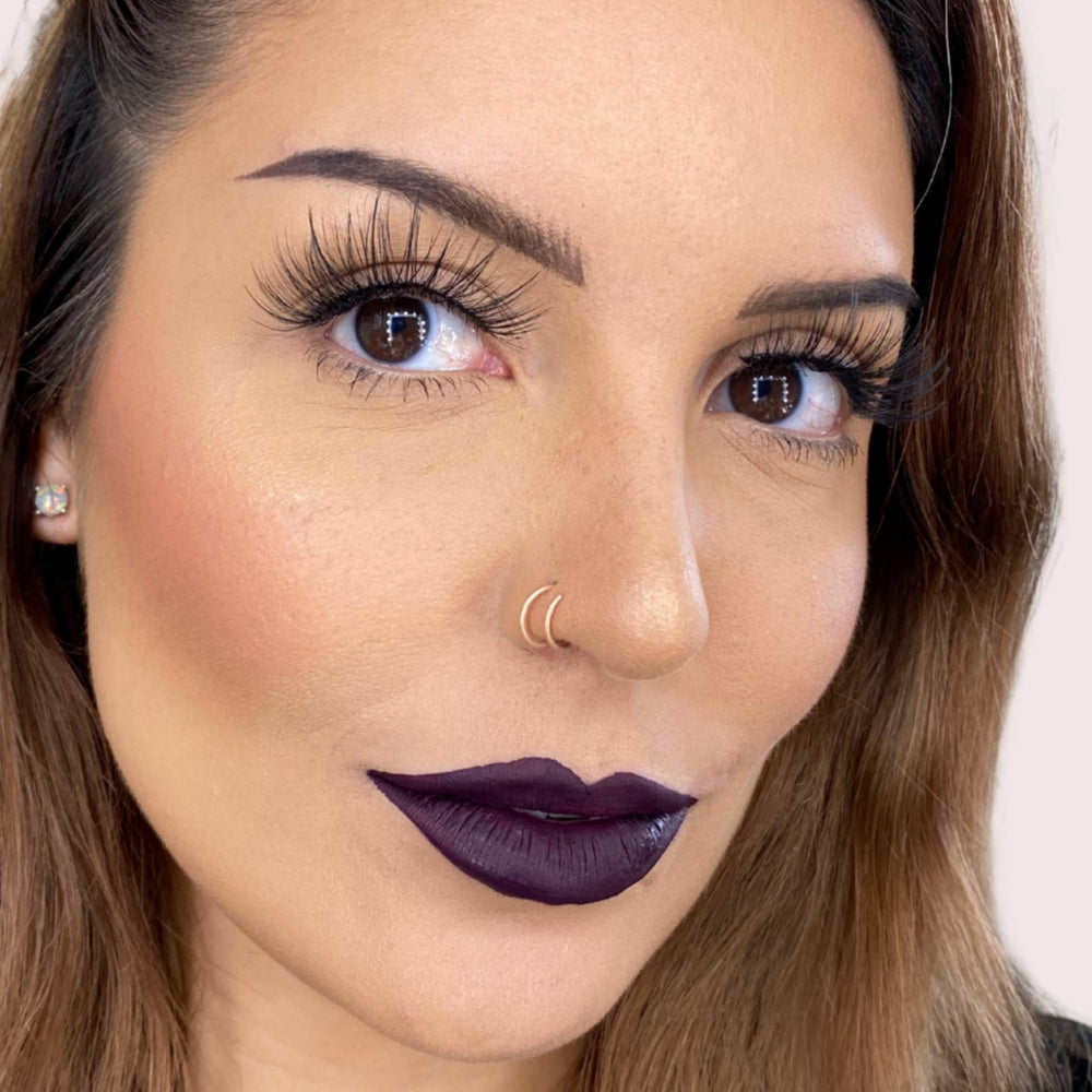The Lip Bar Drama Queen lip color applied for a dramatic evening look.