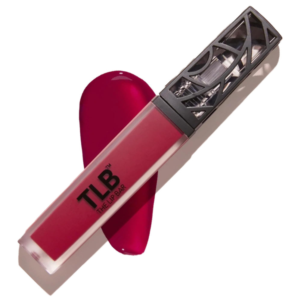 The Lip Bar Rich Auntie Deep Berry application shows rich color on lips