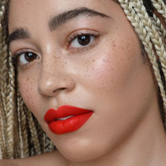The Lip Bar vegan cruelty-free symbol shot reinforces an ethical beauty choice.