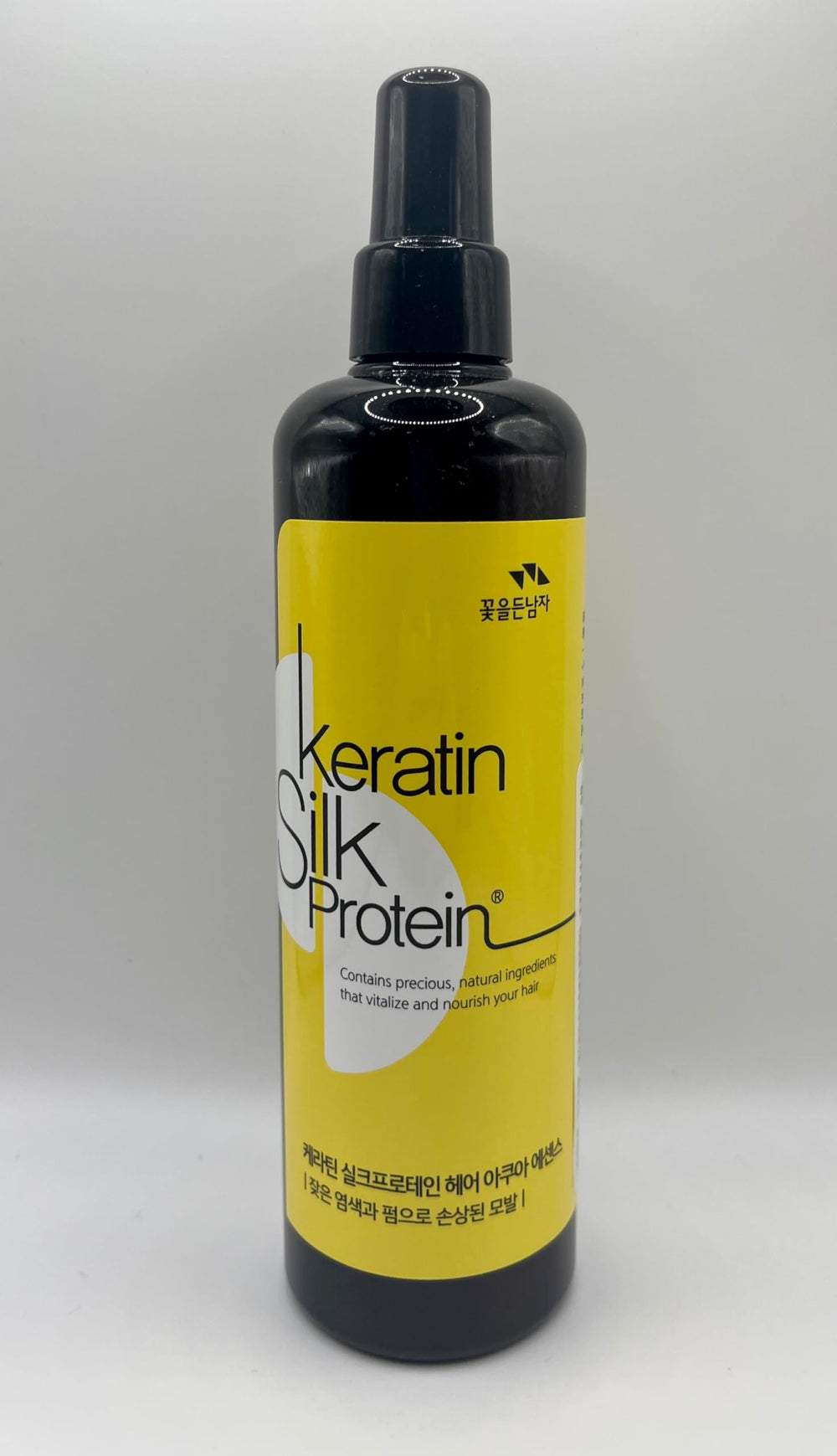 The Man Company Keratin SilkProtein Aqua Essence on hair after application for moisture and shine.