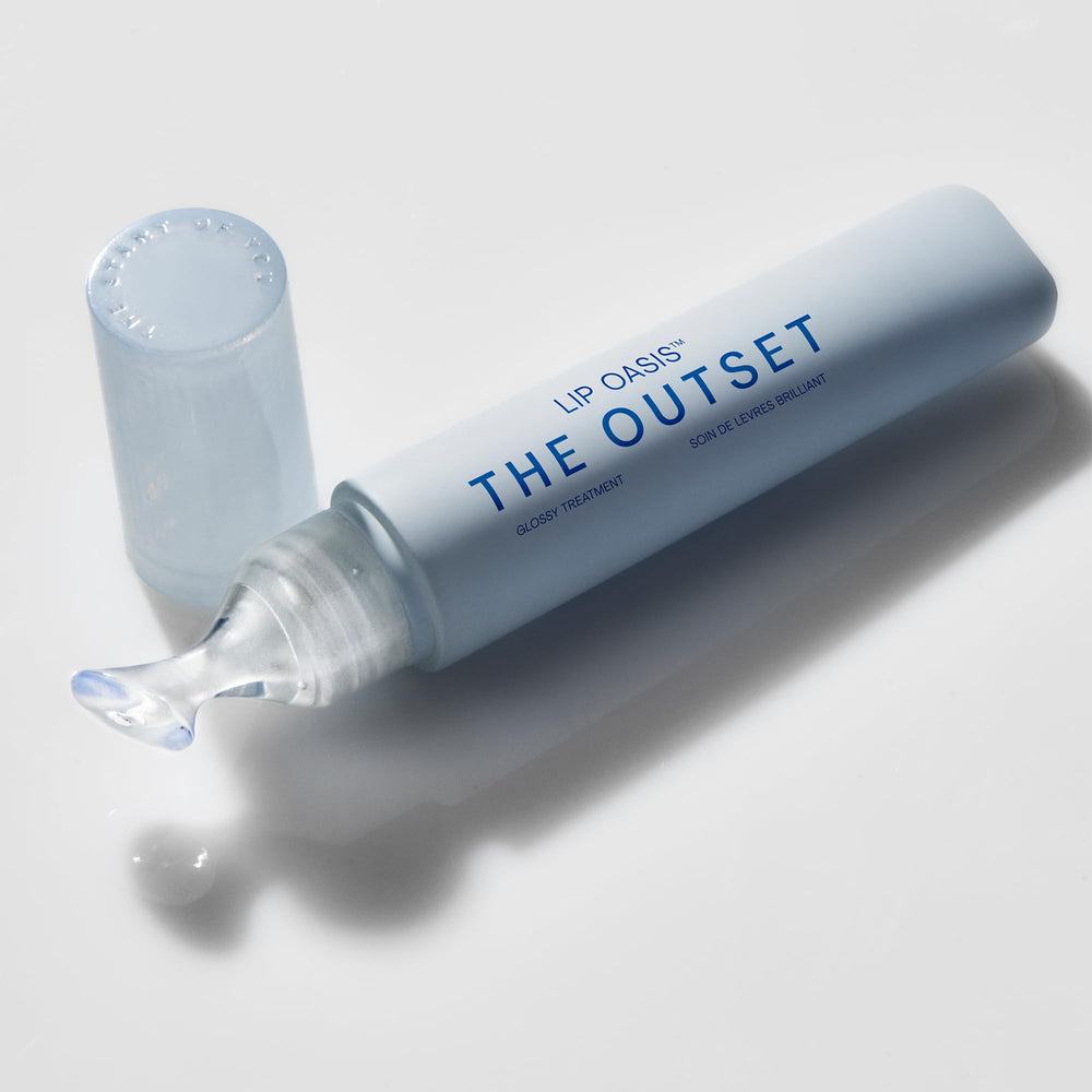 The Outset Lip Oasis glossy-finish applicator demonstrates a non-sticky, luxurious texture.