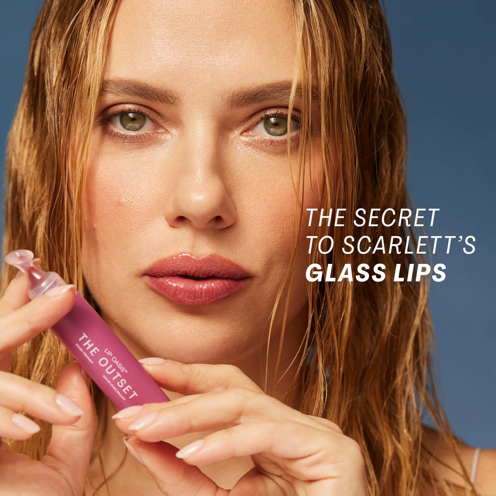 Close-up of The Outset Lip Oasis glossy texture on lips for cushiony, plump look.