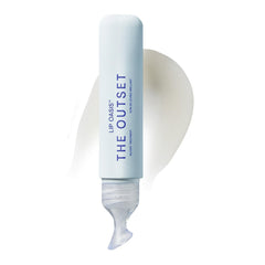 The Outset Lip Oasis hydration-balm with a glassy finish for smooth, moisturized lips.