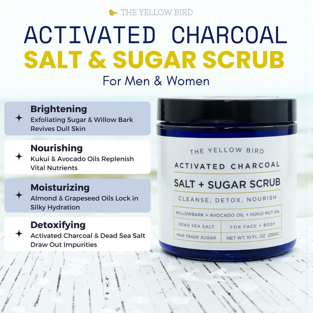 The Yellow Bird activated charcoal scrub texture closeup showing salt and sugar exfoliation.