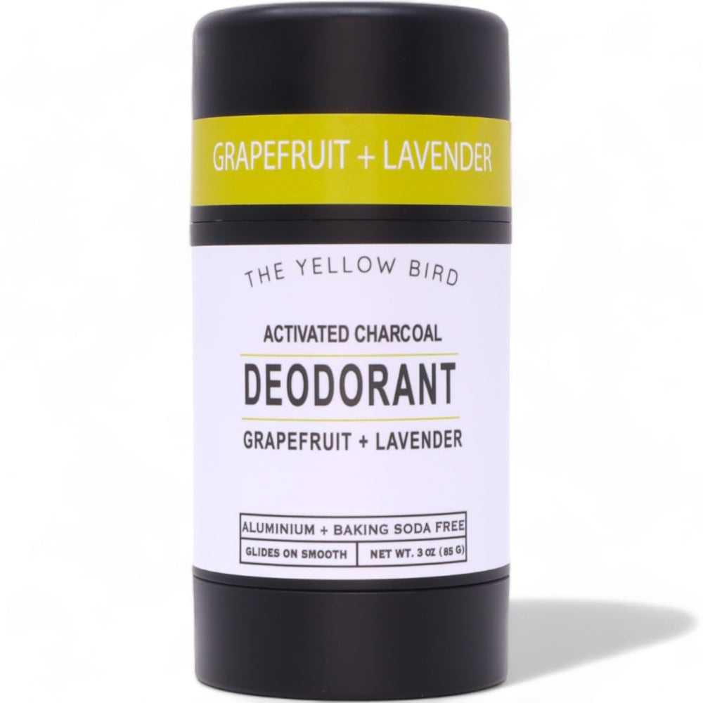 The Yellow Bird natural charcoal deodorant bottle offers smooth application and all-day odor protection.
