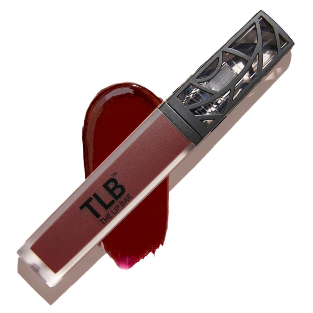 The Lip Bar Rebel swatch shows long-lasting burgundy color.