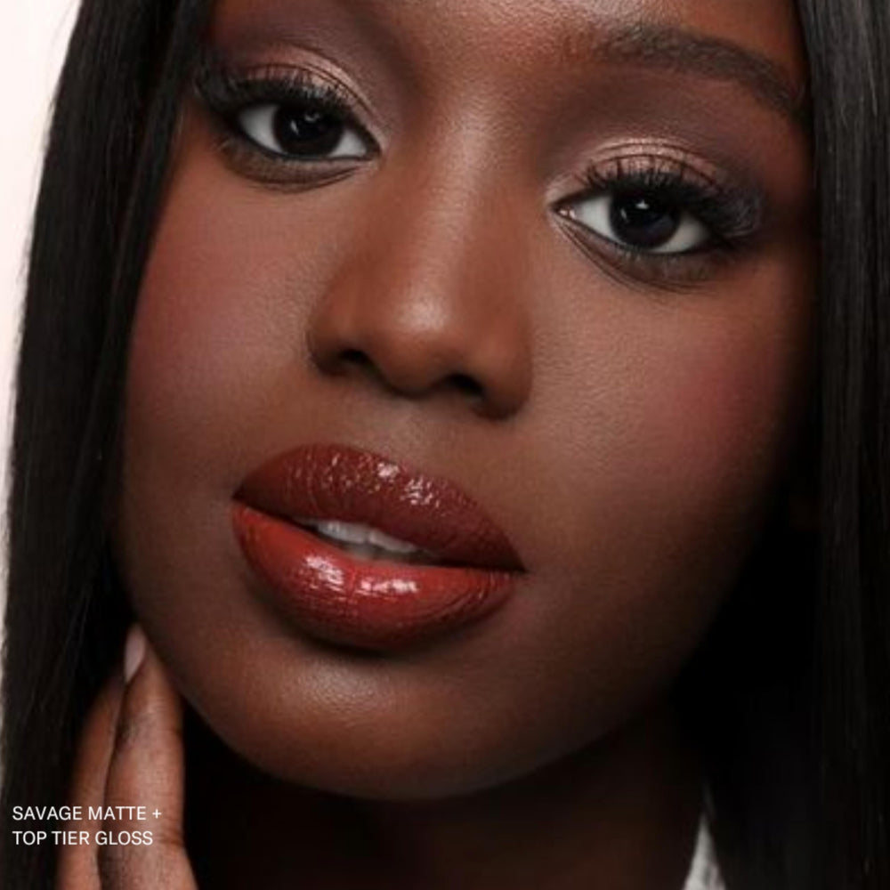 The Lip Bar Savage application closeup demonstrates easy, precise lipstick reach.