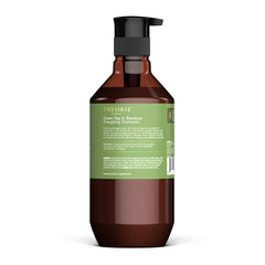 Theorie Green Tea and Bamboo shampoo lather close-up shows refreshing cleanse.