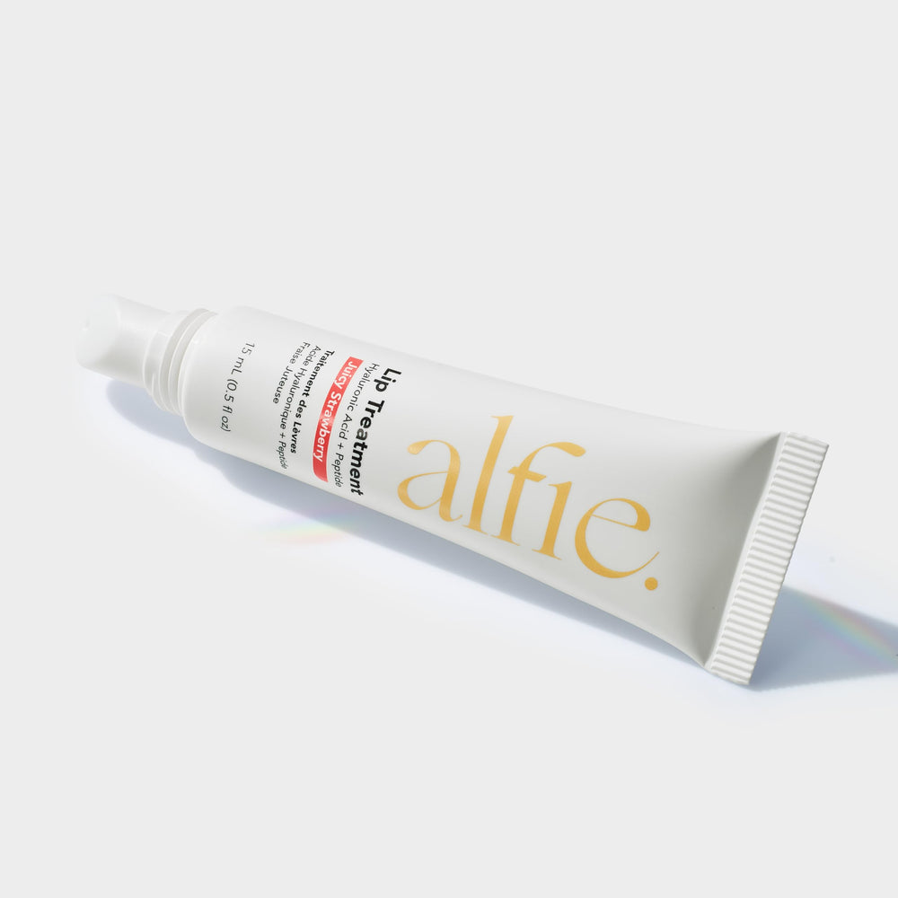 They Call Her Alfie lip booster applicator shows creamy texture and instant softness.