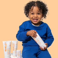 Thinkbaby sunscreen applied during swim time to stay protected