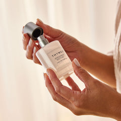 Thymes Bergamot Nectar glass bottle gleaming, inviting everyday fragrance routine.