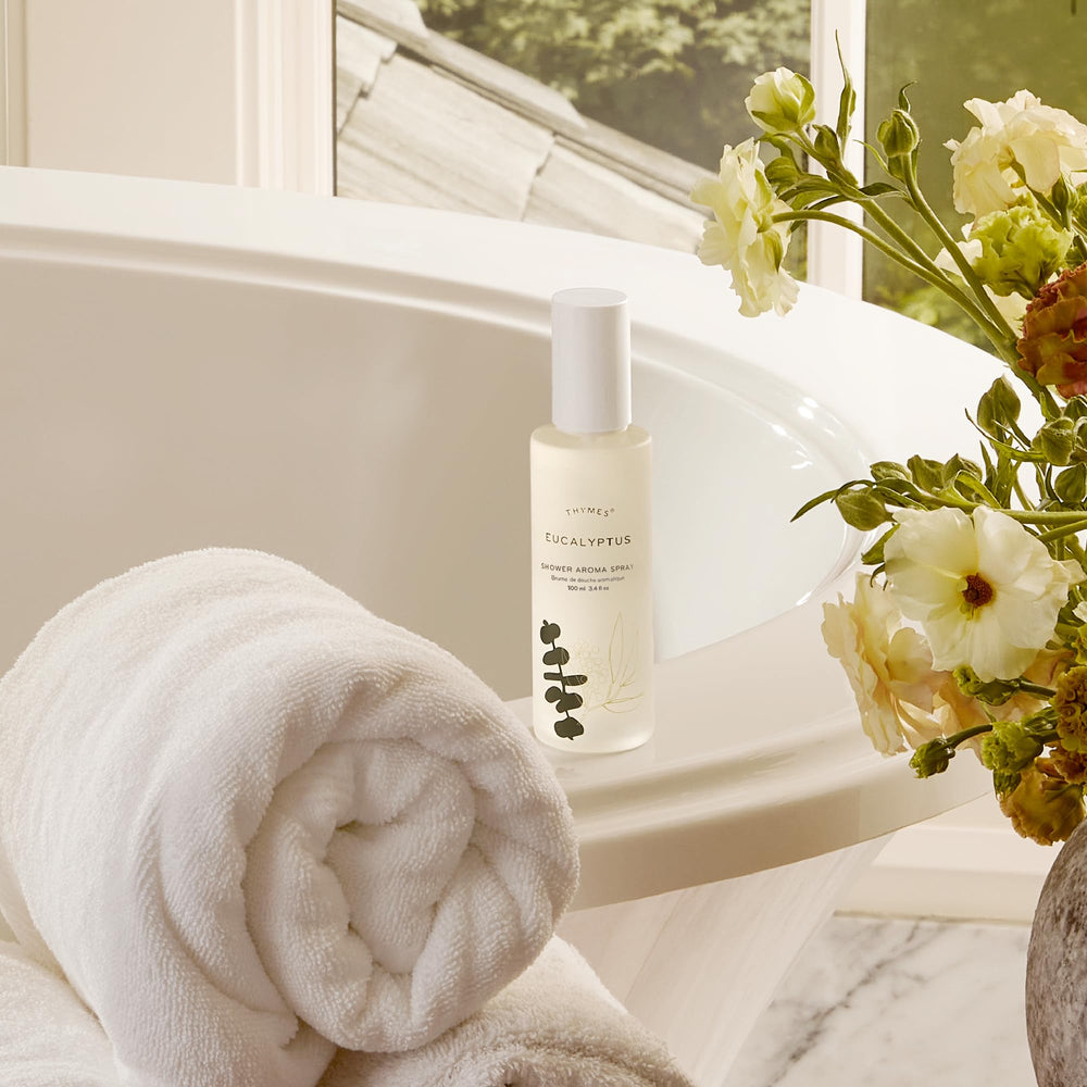 Thymes Eucalyptus Shower Spray label close-up shows premium ingredients.