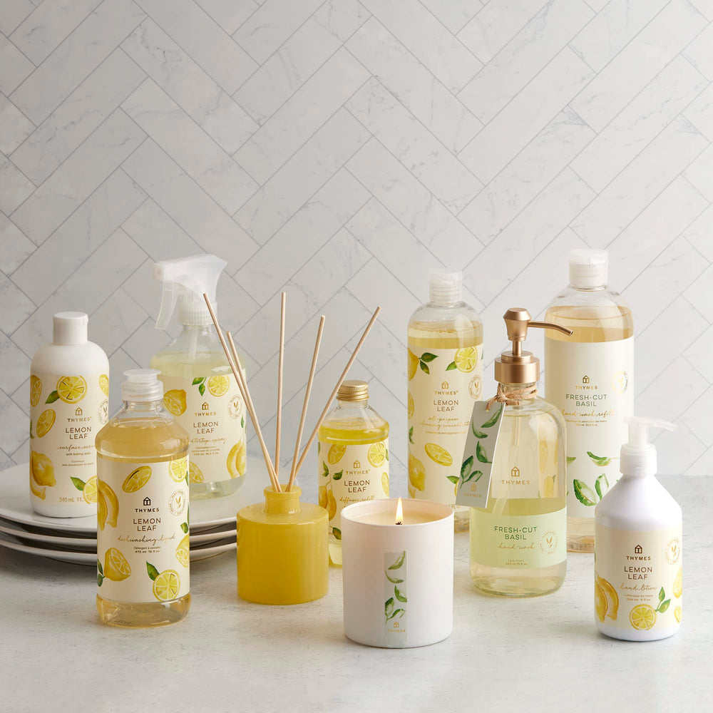 Swirls of Fresh-Cut Basil fragrance in Thymes hand wash imagery.