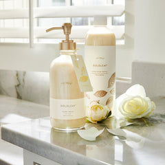 Goldleaf label close-up emphasizes floral notes and premium packaging for a spa-like bathroom.