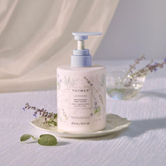 Thymes Lavender Fragrance Lotion highlighting calming scent on skin.