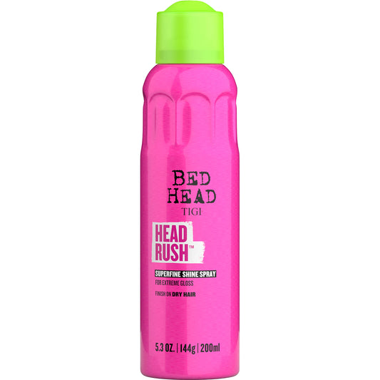 TIGI Bed Head Headrush Shine Spray can releasing a fine mist for glossy hair