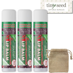 Tiny Seed Chocolate Candy Cane lip balm tube close-up for smooth lips