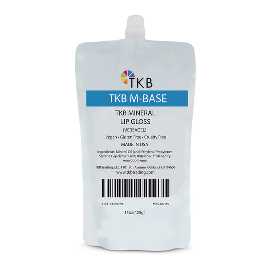 TKB Mineral Lip Gloss M-Base bottle pour shows a crystal-clear base for easy gloss creation.