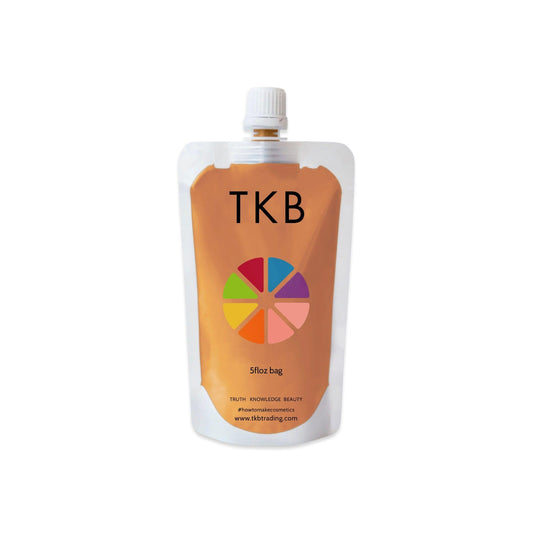 TKB Lip Liquid Presto Change-o color applied on lips for bold shade.